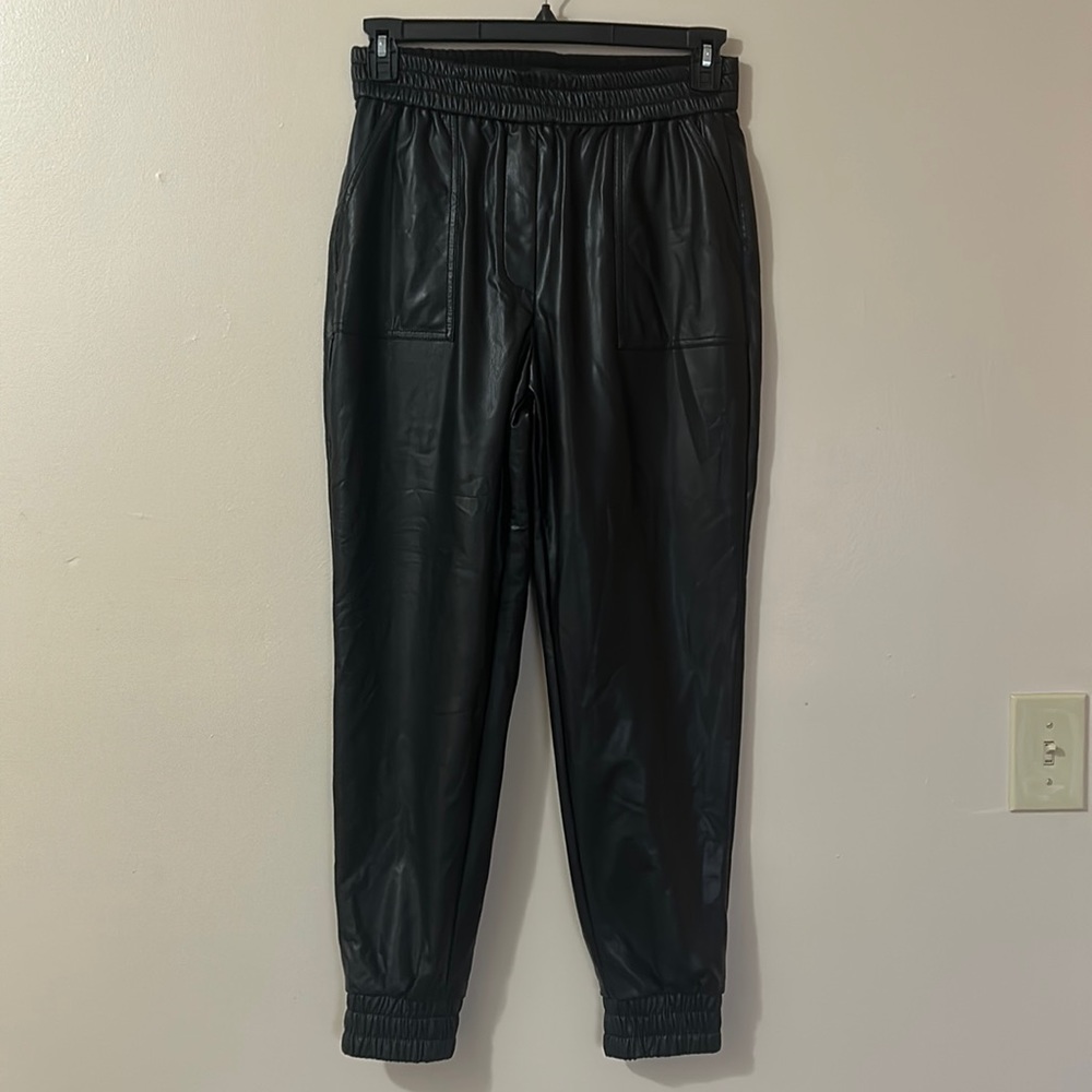 Express black stretchy leather joggers.